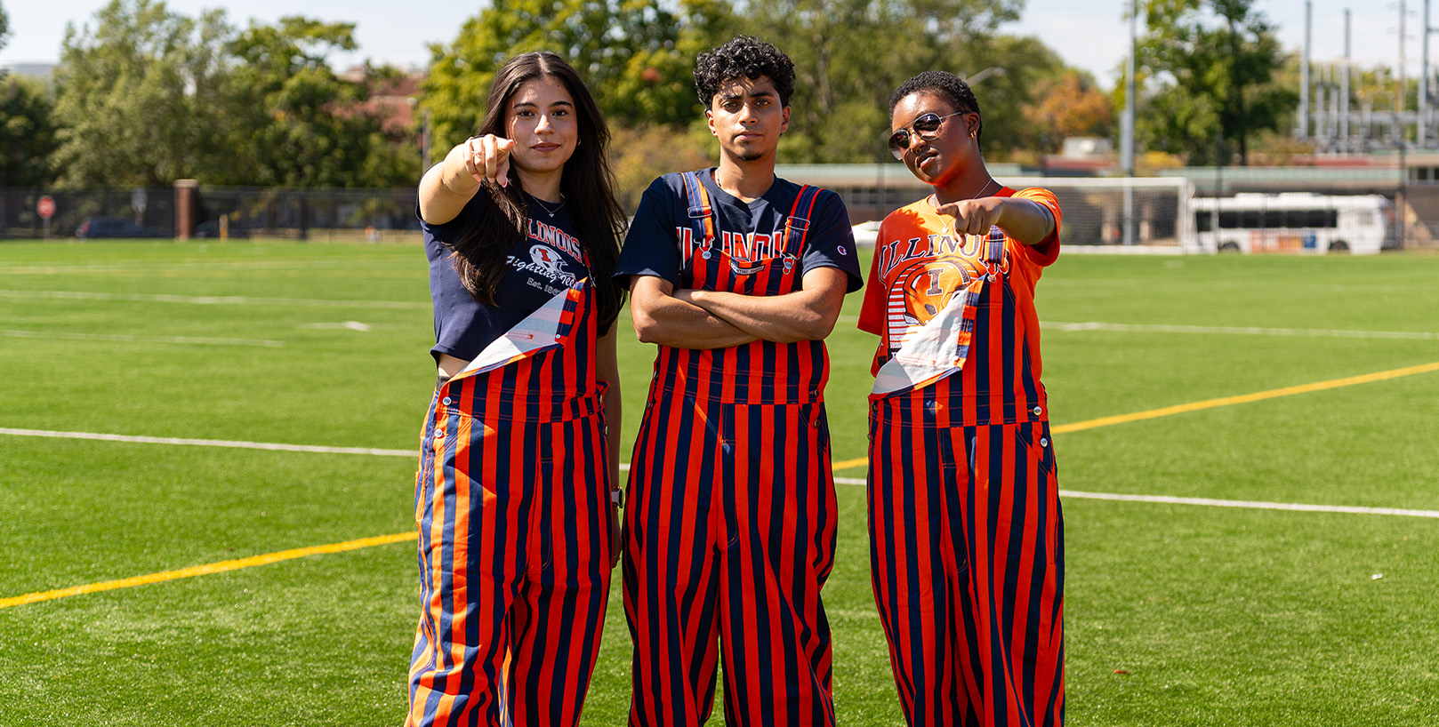 picture of 3 students Wearing game day Bibs
